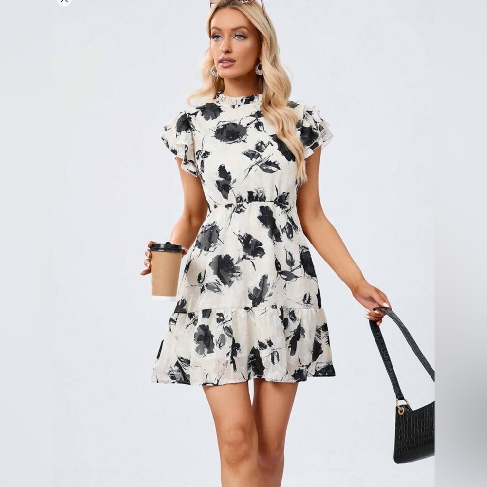 Fun black-and-white dress with silver metallic flowers